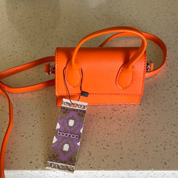 It’s a small bohoo purse. Tiny and cute - Picture 1 of 3
